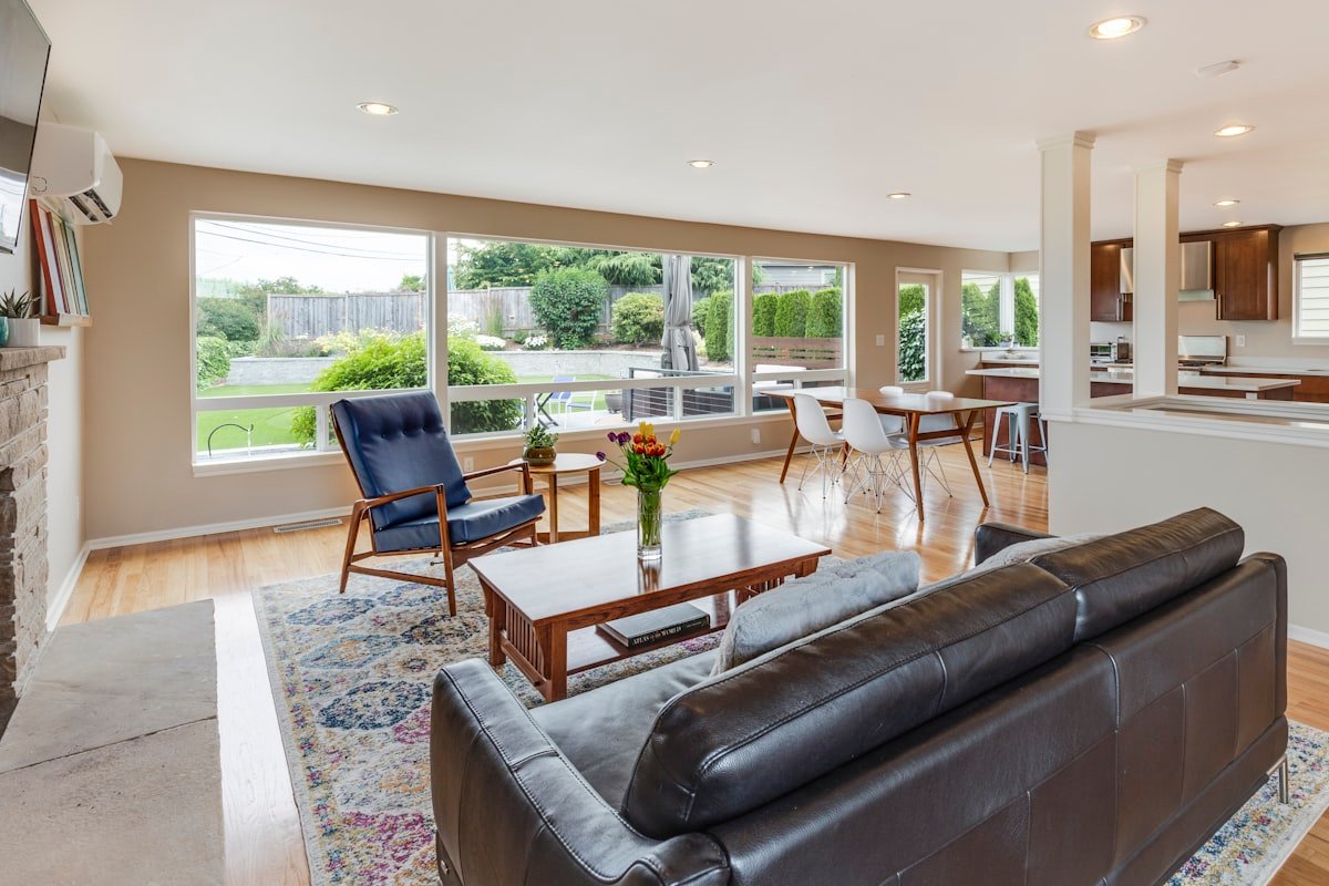 Smart thermostat with solar tracking and TOU optimization in a modern living room climate setup